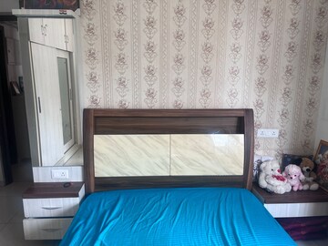 Bedroom in 3 BHK Apartment at Pride World City Kingsbury, Charholi Budruk – for Rent
