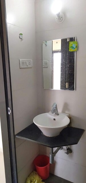 Bathroom in 1 BHK Apartment at Palash Towers, Andheri West – for Sale