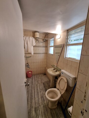 Bathroom in 2 BHK Apartment at Sanskruti Prabhat, Prabhat Road – for Rent