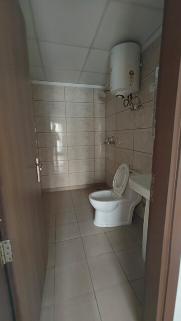 Bathroom in 3 BHK Apartment at Gardenia Square I, Dundahera – for Sale