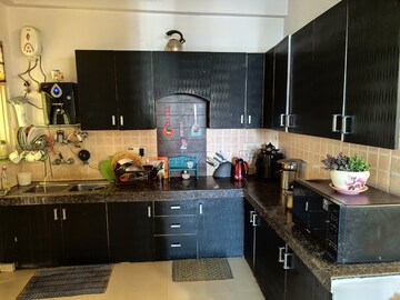 Kitchen in 3 BHK Apartment at Uninav Heights Phase I, Raj Nagar Extension – for Rent