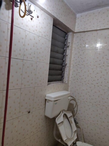 Bathroom in 2 BHK Apartment at Nirman Nisarga, Bhusari Colony – for Rent