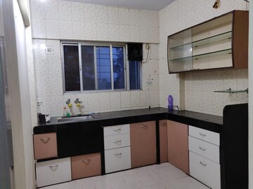 Kitchen in 2 BHK Apartment at Nirman Nisarga, Bhusari Colony – for Rent