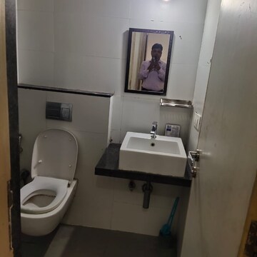 Bathroom in 2 BHK Apartment at Rustomjee Urbania Azziano, Vrindavan Society – for Rent