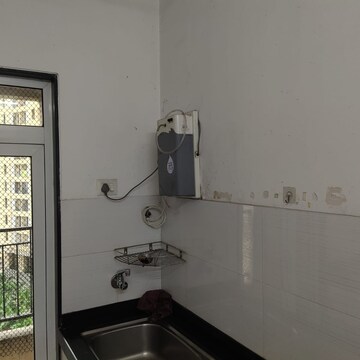 Bathroom in 2 BHK Apartment at Rustomjee Urbania Azziano, Vrindavan Society – for Rent