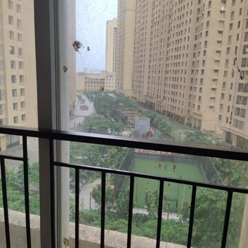 Balcony in 2 BHK Apartment at Rustomjee Urbania Azziano, Vrindavan Society – for Rent