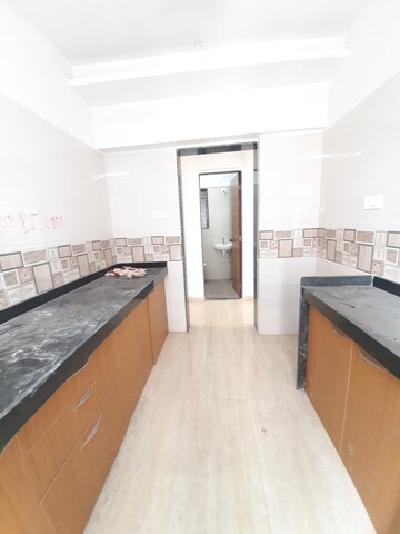 Kitchen in 2 BHK Apartment at Je and Vee Vrindavan, Malad East – for Rent