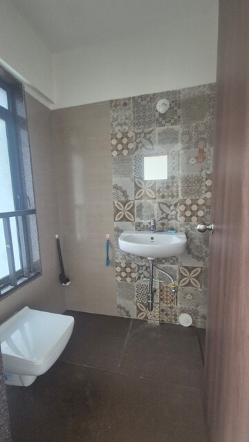 Bathroom in 2 BHK Apartment at Acme Oasis, Kandivali East – for Rent