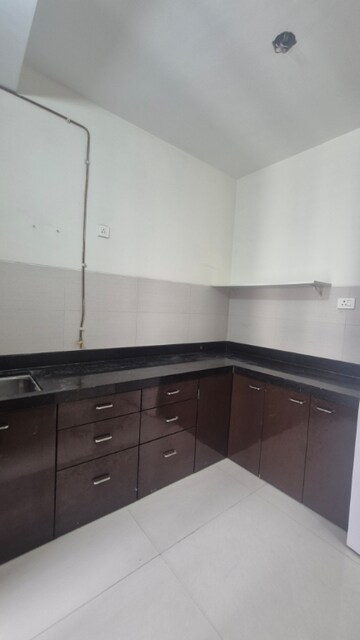 Kitchen in 2 BHK Apartment at Acme Oasis, Kandivali East – for Rent