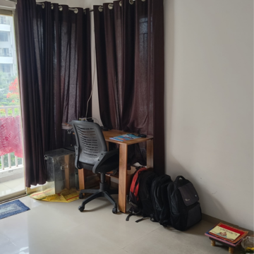 Living Room in 2 BHK Apartment at Paramount Altissimo, Wakad – for Sale