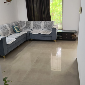 Living Room in 2 BHK Apartment at Paramount Altissimo, Wakad – for Sale