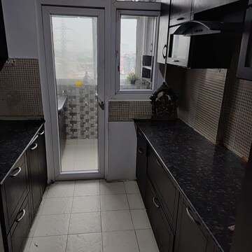 Kitchen in 4 BHK Apartment at Supertech Cape Town, Sector 74 – for Rent