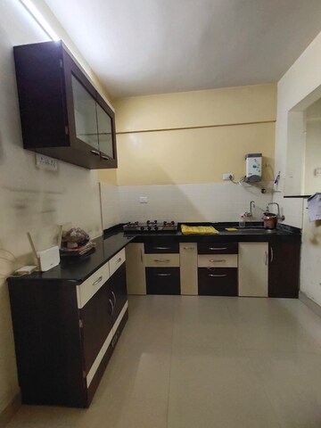 Kitchen in 2 BHK Apartment at Aishwaryam Greens Co-operative Housing Society, Wakad – for Rent