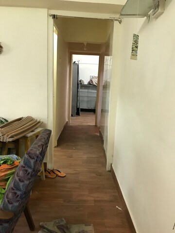 Living Room in 1 BHK Apartment at Mhatre Tower, Ic Colony – for Rent