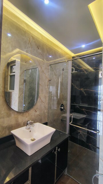 Bathroom in 3 BHK Builder Floor at DLF Atria, Dlf Phase ii – for Rent