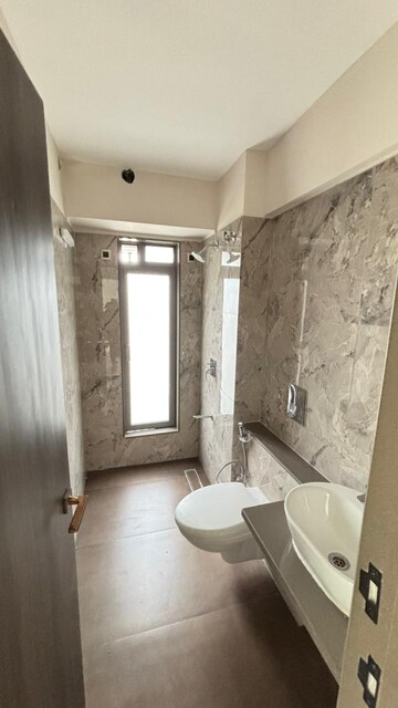 Bathroom in 2 BHK Apartment at Paradigm Artteza, Santacruz West – for Rent