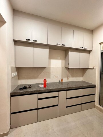 Kitchen in 2 BHK Apartment at Piramal Vaikunth, Balkum Pada – for Rent