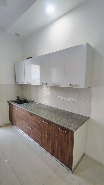 Kitchen in 3.5 BHK Builder Floor at Hong Kong Bazaar, Sector 57 – for Rent