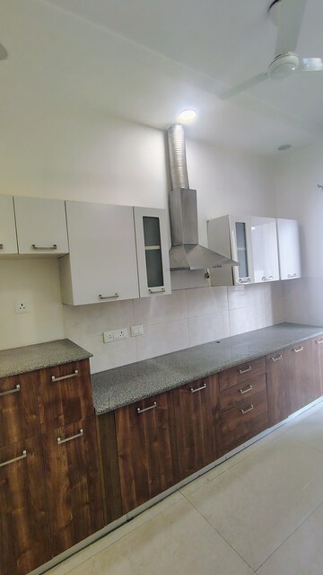 Kitchen in 3.5 BHK Builder Floor at Hong Kong Bazaar, Sector 57 – for Rent