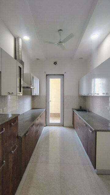 Kitchen in 3.5 BHK Builder Floor at Hong Kong Bazaar, Sector 57 – for Rent