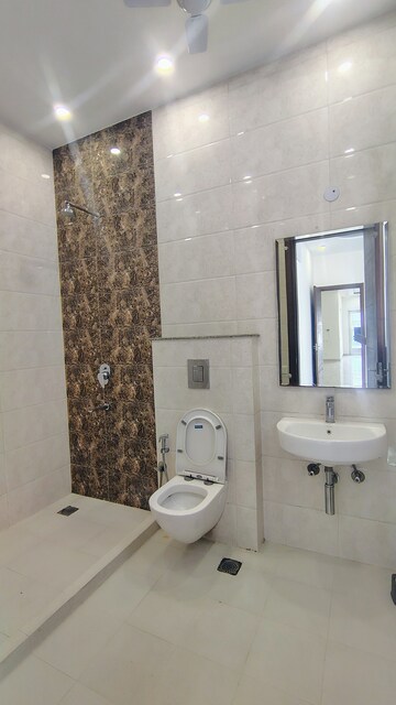 Bathroom in 3.5 BHK Builder Floor at Hong Kong Bazaar, Sector 57 – for Rent