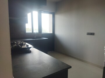 Kitchen in 4 BHK Apartment at Imperial Navkis Celeste, Rmv Extension – for Rent