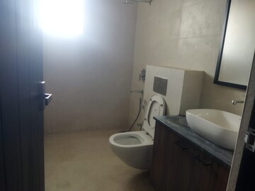 Bathroom in 4 BHK Apartment at Imperial Navkis Celeste, Rmv Extension – for Rent