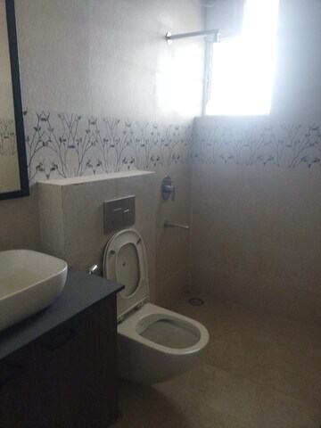Bathroom in 4 BHK Apartment at Imperial Navkis Celeste, Rmv Extension – for Rent