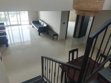Staircase in 4 BHK Apartment at Imperial Navkis Celeste, Rmv Extension – for Rent