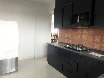 Kitchen in 4 BHK Apartment at Imperial Navkis Celeste, Rmv Extension – for Rent