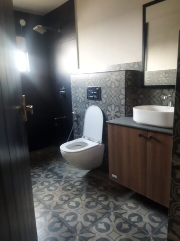 Bathroom in 4 BHK Apartment at Imperial Navkis Celeste, Rmv Extension – for Rent