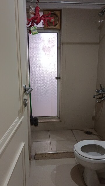 Bathroom in 2 BHK Apartment at Hiranandani Meadows, Manpada – for Rent