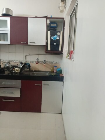 Kitchen in 2 BHK Apartment at Janki Rainbow Apartments, Baner – for Rent