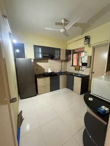 Kitchen in 2 BHK Apartment at Sonigara Omega Paradise, Wakad – for Rent