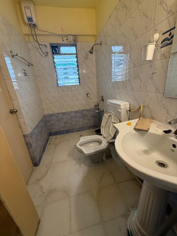 Bathroom in 2 BHK Apartment at Sonigara Omega Paradise, Wakad – for Rent
