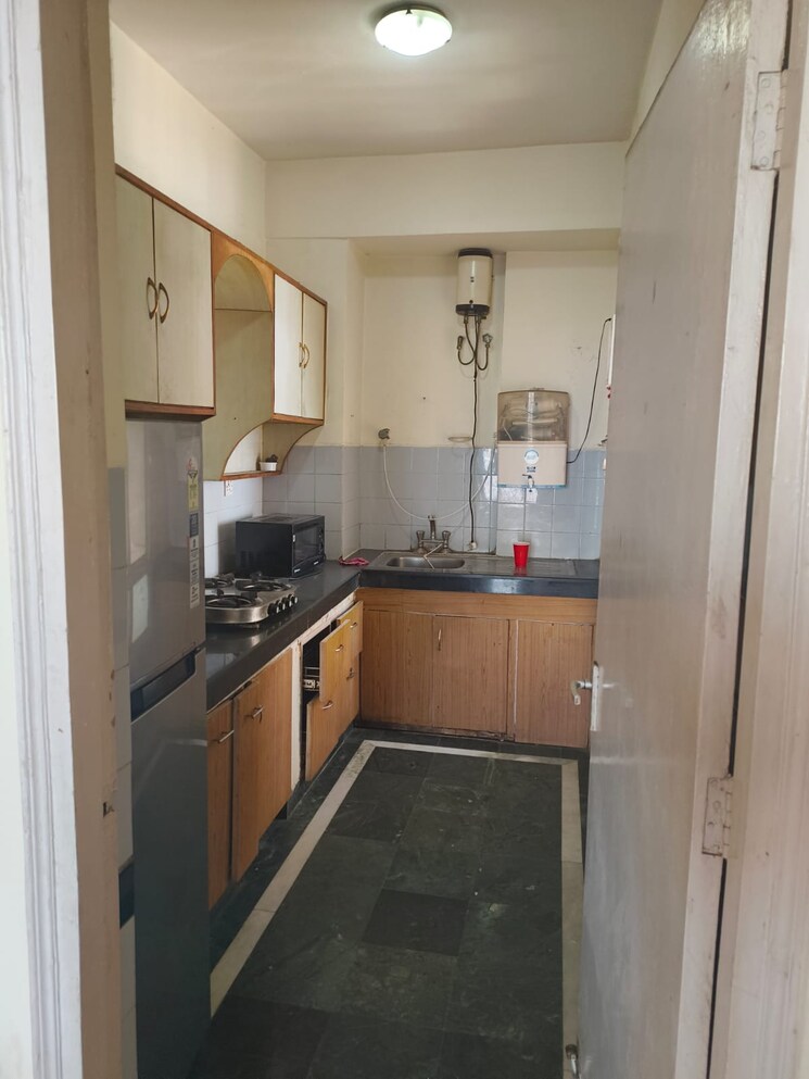 Kitchen, dlf-city-phase-iv 2 Bedroom 1200 Sq.Ft. Apartment In Dlf Phase iv Gurgaon 8933499