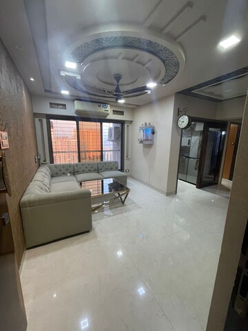 Living Room in 2 BHK Apartment at Unique Aurum, Mira Road – for Sale