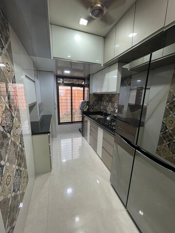 Kitchen in 2 BHK Apartment at Unique Aurum, Mira Road – for Sale
