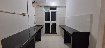 Kitchen in 2 BHK Apartment at Godrej Emerald, Ghodbunder Road – for Rent