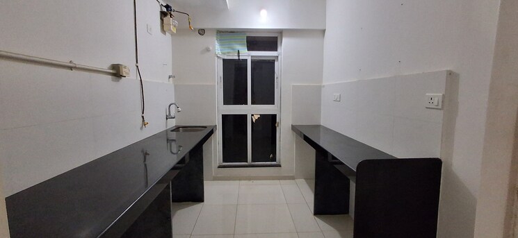 Kitchen, godrej-emerald 2 Bedroom 720 Sq.Ft. Apartment In Ghodbunder Road Thane 8933572