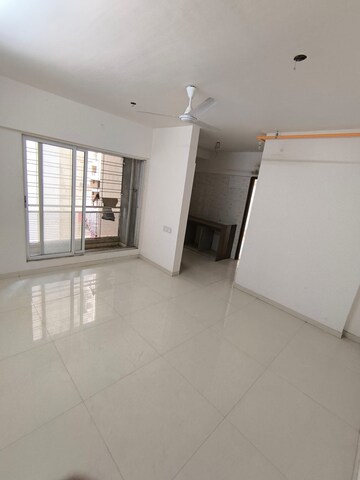 Living Room in 1 BHK Apartment at Ravi Gaurav Crest, Mira Road – for Sale