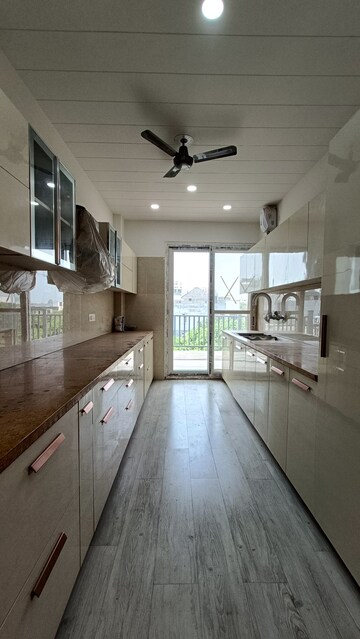 Kitchen in 4 BHK Builder Floor at Sushant Lok I – for Sale