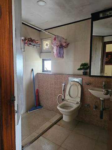 Bathroom in 3 BHK Apartment at Ambuja Neotia Bengal Ambuja Upohar, Garia – for Rent