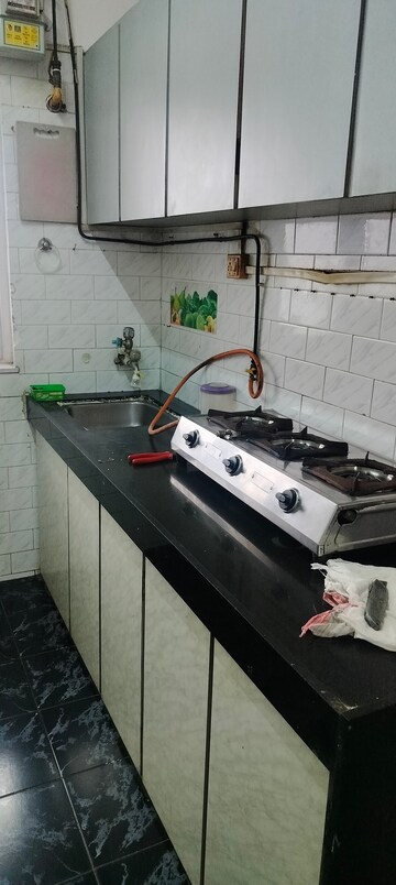 Kitchen in 1 BHK Apartment at Montana CHS, Andheri West – for Rent