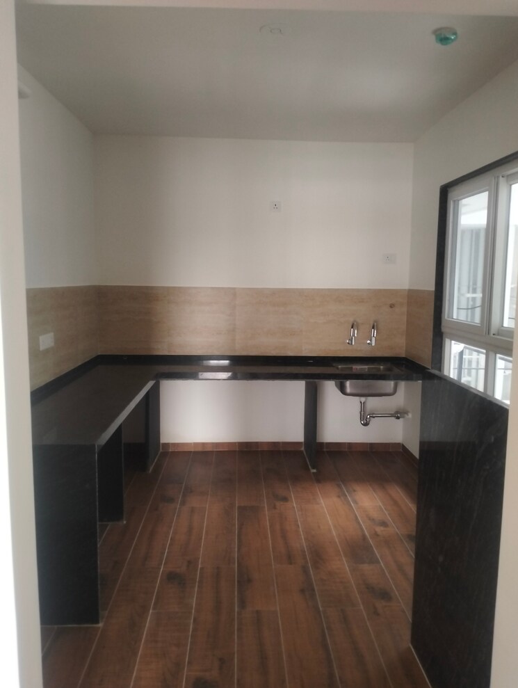 Kitchen, unique-k-town 4 Bedroom 1750 Sq.Ft. Apartment In Kiwale Pune 8933818