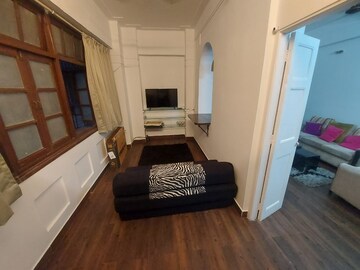 Living Room in 1 BHK Apartment at Khar West – for Rent