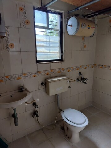 Bathroom in 2 BHK Apartment at Atharva Garden, Kharadi – for Rent