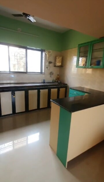 Kitchen in 2 BHK Apartment at Silver Anklet Apartments, Versova – for Rent