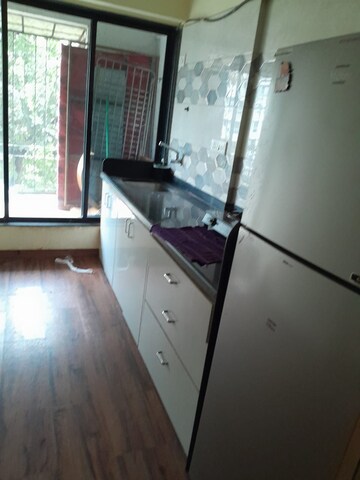 Kitchen in 1 BHK Apartment at Philjoy CHS, Borivali West – for Sale