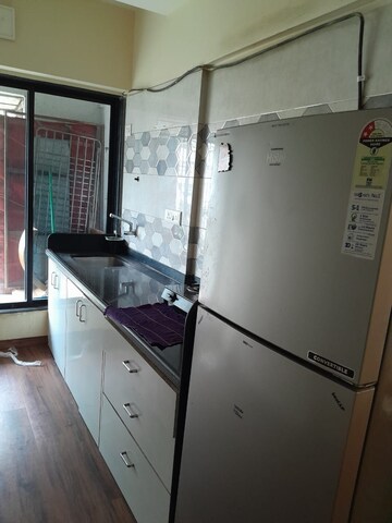 Kitchen in 1 BHK Apartment at Philjoy CHS, Borivali West – for Sale